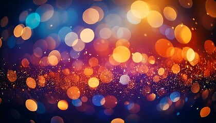 Colorful bokeh effect with various sizes of circular light spots in shades of blue, orange, and yellow. 