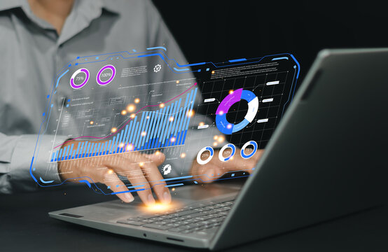 Artificial intelligence and data analysis concept. Businessman using AI-powered technology to process big data, generate insights, Futuristic digital transformation in finance and business.