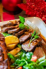 Roasted whole chicken with christmas decoration holiday december snow