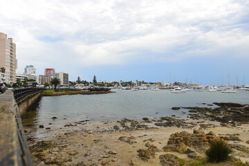 Punta del Este, Uruguay 18-05-2025:: A walk enjoying the views of the harbour at the Punta del Este Puerto in the province of Maldonado. Pile of Small Boats and Yachts on the Sea at the Port. 