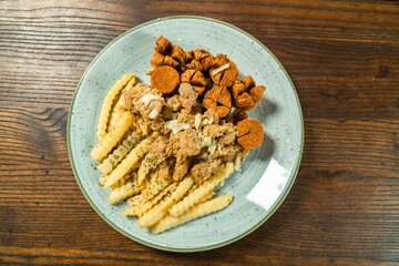 Chicken Plattern Sausage French Fries and sauce