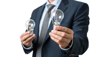 Businessman with a bright idea light bulb in hands for business innovation and success