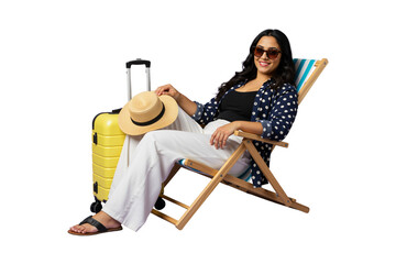 Elegant vacationer lounging in beach chair with bright yellow luggage and straw hat enjoying tropical getaway vibes