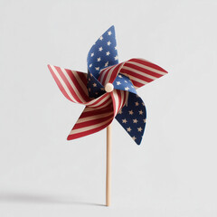 A paper pinwheel in American flag colors. Clean composition is ideal for patriotic designs and festive U.S. holiday themes.