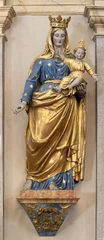  CHAMONIX, FRANCE - JULY 5, 2022: The carved polychrome statue of Madonna of St. Michael church by unknown baroque artis © Renáta Sedmáková