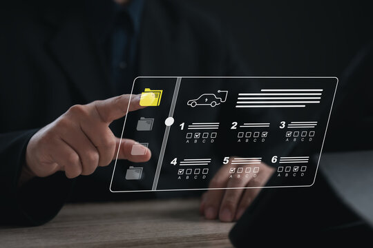 Technician using digital interface to review select electric vehicle inspection items on virtual checklist, representing smart EV maintenance, performance evaluation, modern automotive diagnostics.
