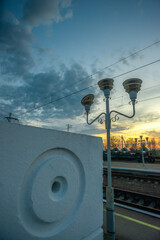 Train Station Platform Lamppost and Concrete Wall at Twilight