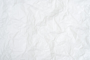 Top view and full frame of wrinkled or crumpled white paper texture used as crumpled white paper background texture in decorative art work