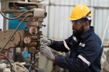 Industry factory, machine. Engineer worker, maintain, repair mechanism of operation of drilling...