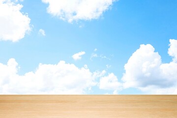 Wooden table and gold-blue backdrop used for product promotion and as a background for product display.