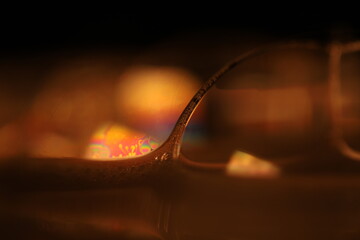 Oil production, brown bubbles in macro, texture of viscous black liquid, oil in laboratory