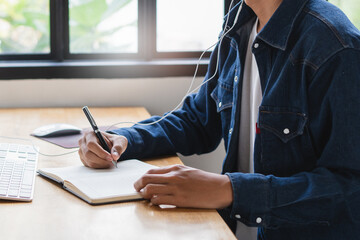 asian teenage learning at home via internet