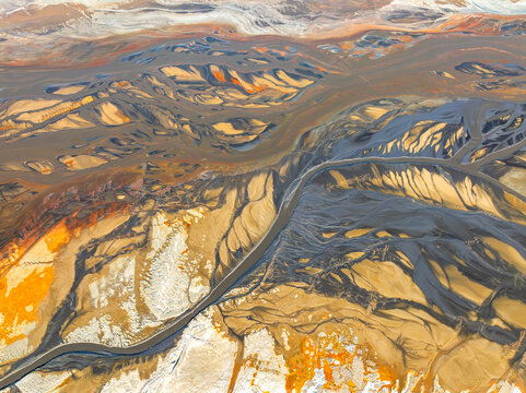 Aerial view of complex river patterns in an arid landscape