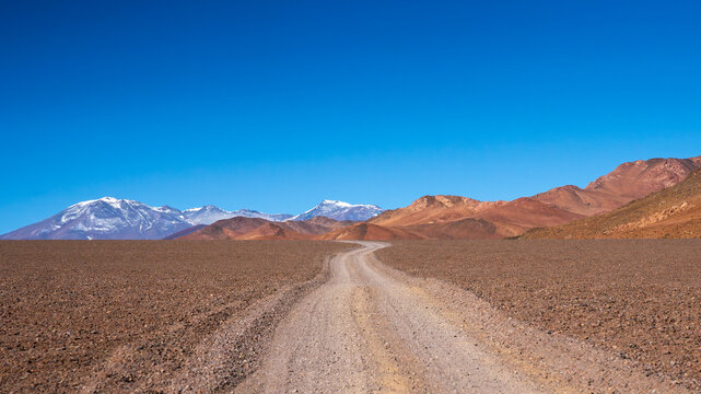 Remote road through arid landscape in La Puna, Argentina