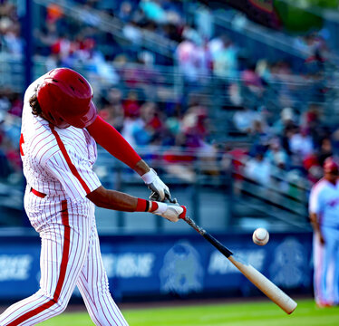 baseball player swinging