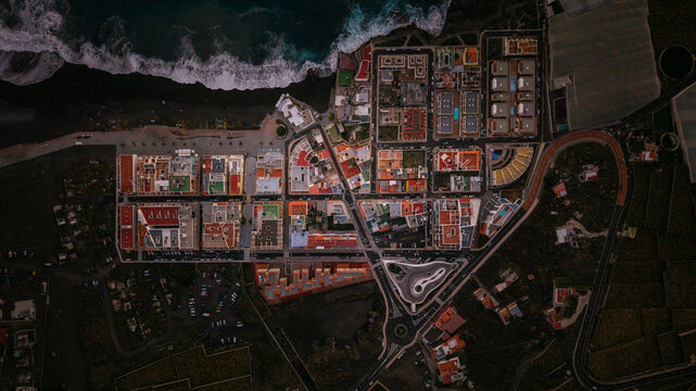 Aerial view of puerto naos town with beautiful buildings and scenic beach at blue hour, Los Llanos de Aridane, Santa Cruz de Tenerife, Spain.