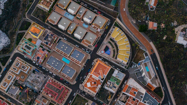 Aerial view of beautiful city complex and modern buildings at blue hour, Puerto Naos Town, La Palma Island, Canary Islands, Spain.