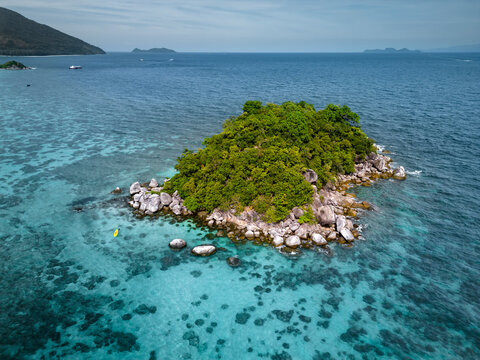 Aerial view of beautiful Ko Kla island with turquoise waters and sandy beaches, Koh Lipe island, Thailand.