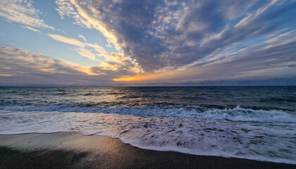 Beautiful colorful dramatic sky with clouds at sunset or sunrise