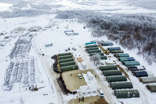 Aerial view of lipa refugee camp with temporary housing in snow, bihac, bosnia and herzegovina.