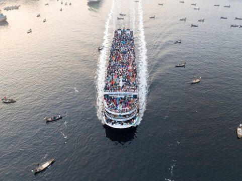 Aerial view of crowded boats on water during Eid al-Fitr celebration, Subhadya, Keraniganj, Dhaka, Bangladesh.