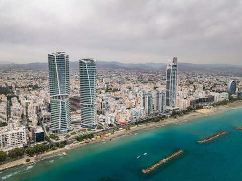 Aerial view of beautiful urban skyline with high-rise buildings along the coastline and blue sea, Limassol, Limassol, Cyprus.