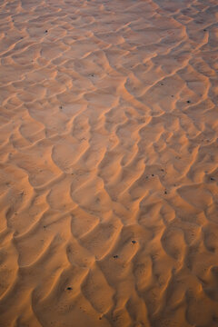 Aerial view of beautiful patterns and textures in the vast Dubai Desert, Dubai, United Arab Emirates.