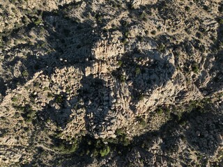 Top-Down Aerial View of Rugged Rock Formations in Yucca Valley, California
