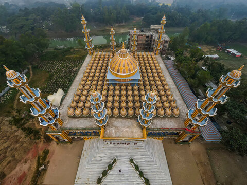 Aerial view of the 201 Dome Mosque with its impressive minarets and sacred architecture, Gopalpur, Bangladesh.
