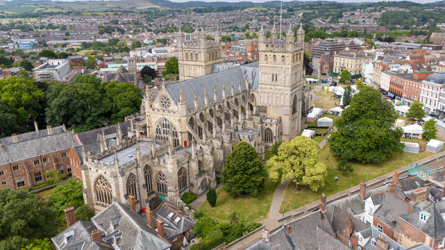 Aerial view of exeter cathedral and the historic city surrounded by greenery, exeter, united kingdom.