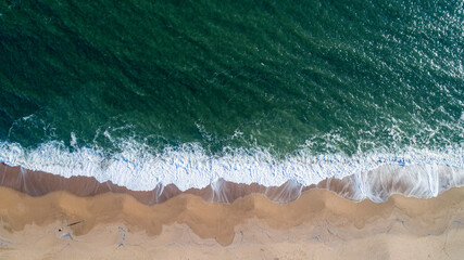 Aerial view of transparent turquoise water and sandy beach, Mansa Beach, Punta del Este, Uruguay.