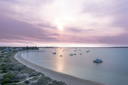 Aerial view of serene Mangles Bay with beautiful sunset, Rockingham, Australia.