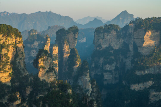 Aerial view of Zhangjiajie National Forest Park at sunset on Avatar mountains, located in Zhangjiajie, Hunan Province, China.