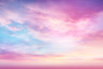 Obraz premium The sky is filled with fluffy pink clouds, creating a serene and peaceful atmosphere. The colors of the clouds are vibrant and eye-catching, making the scene feel almost magical