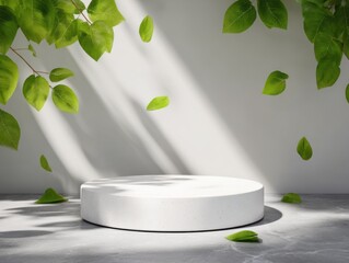 White Podium Display with Green Leaves and Sunlight Casting Shadows for Product Presentation Studio Shot