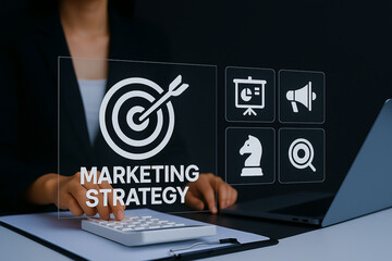Holographic marketing funnel and target icons above calculator and laptop.