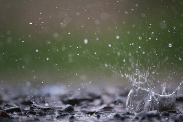 rain was falling on the roadway due to precipitation that was forming after depression hit Thailand causing heavy rain in some areas and flooding road surface. Behind the scenes of heavy rain