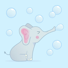 Cute elephant blowing bubbles through its trunk