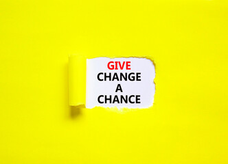 Give change a chance symbol. Concept words phrase Give change a chance on beautiful white paper. Beautiful yellow paper background. Business motivational Give change a chance concept. Copy space.