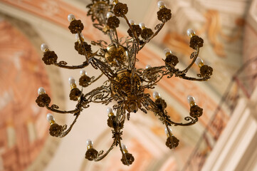 beautiful chandelier on the ceiling of a Catholic church