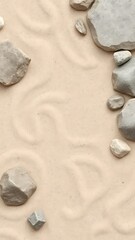 Beige sand texture background with assorted grey and white stones