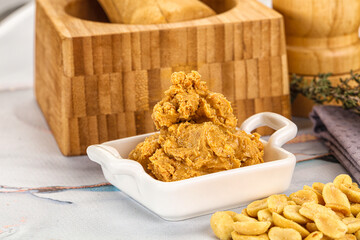 Crunchy peanut butter fat product
