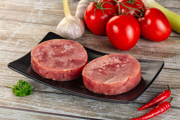 Raw round tuna fish fillet