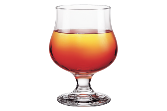 A glass of sunset Glowing drink on black radiating warmth