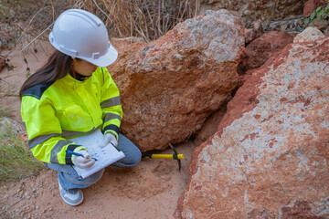 Geologist surveying mine,Explorers collect soil samples to look for minerals,exploring the depths...