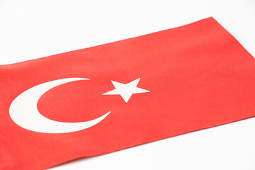 Turkey flag on white background, red cloth with white crescent and star