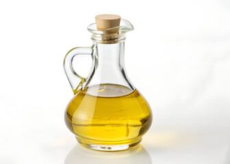 Glass bottle of yellow cooking oil isolated on white background, healthy vegetable oil in transparent cruet, clean and high-resolution image of organic edible oil used for frying and salad dressing