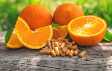 orange essential oil in a bottle. Selective focus.