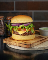 hamburger on a wooden board
