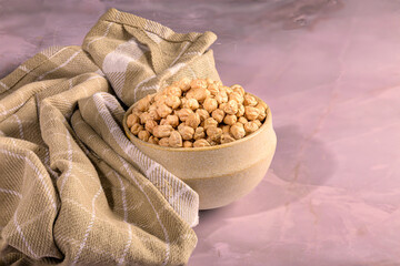 Bowl of chickpeas on folded cloth